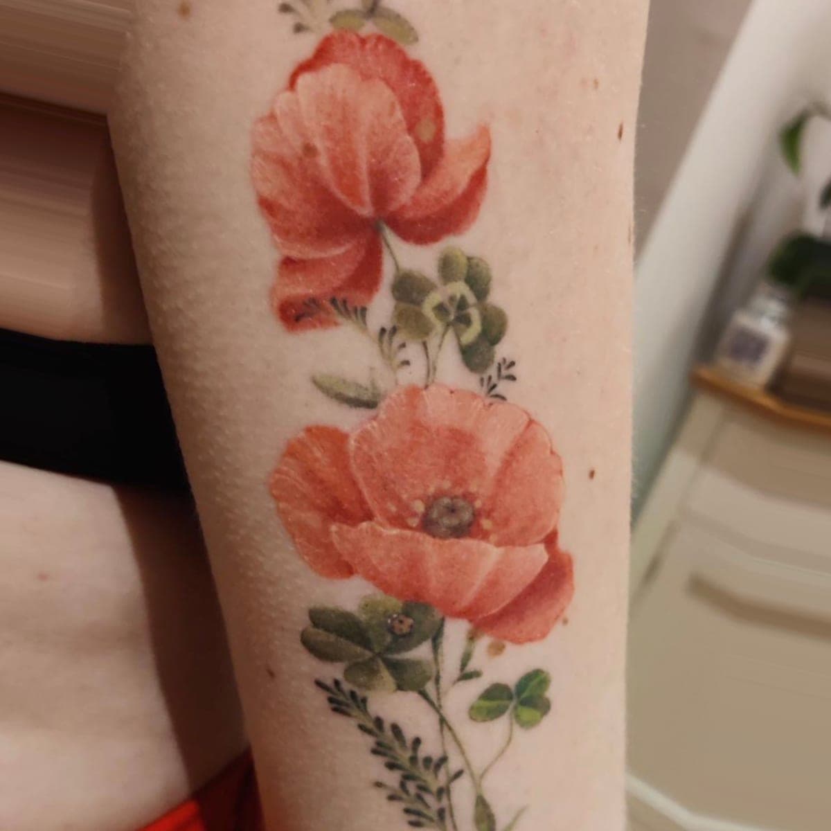 The same poppy tattoo once healed